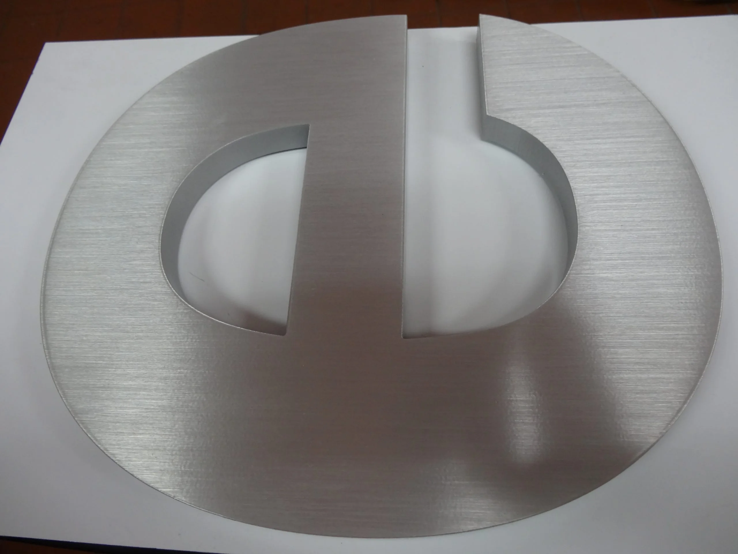 Fabricated metal letter released to production only after approval