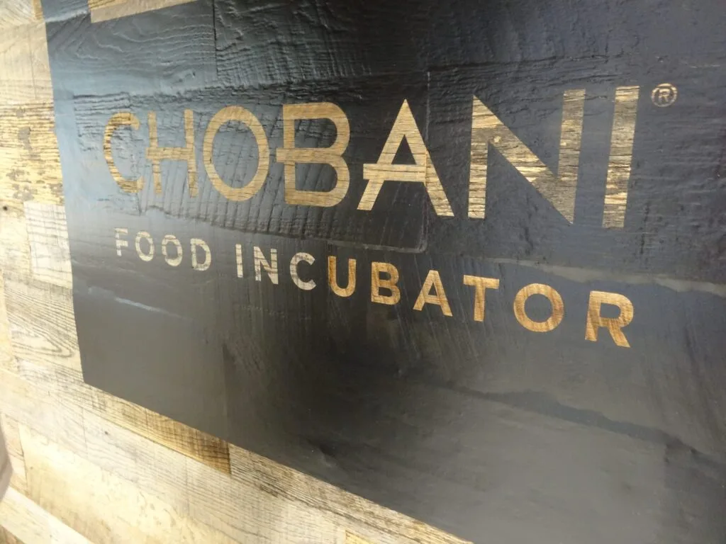 Hand painted lettering on a food business wall