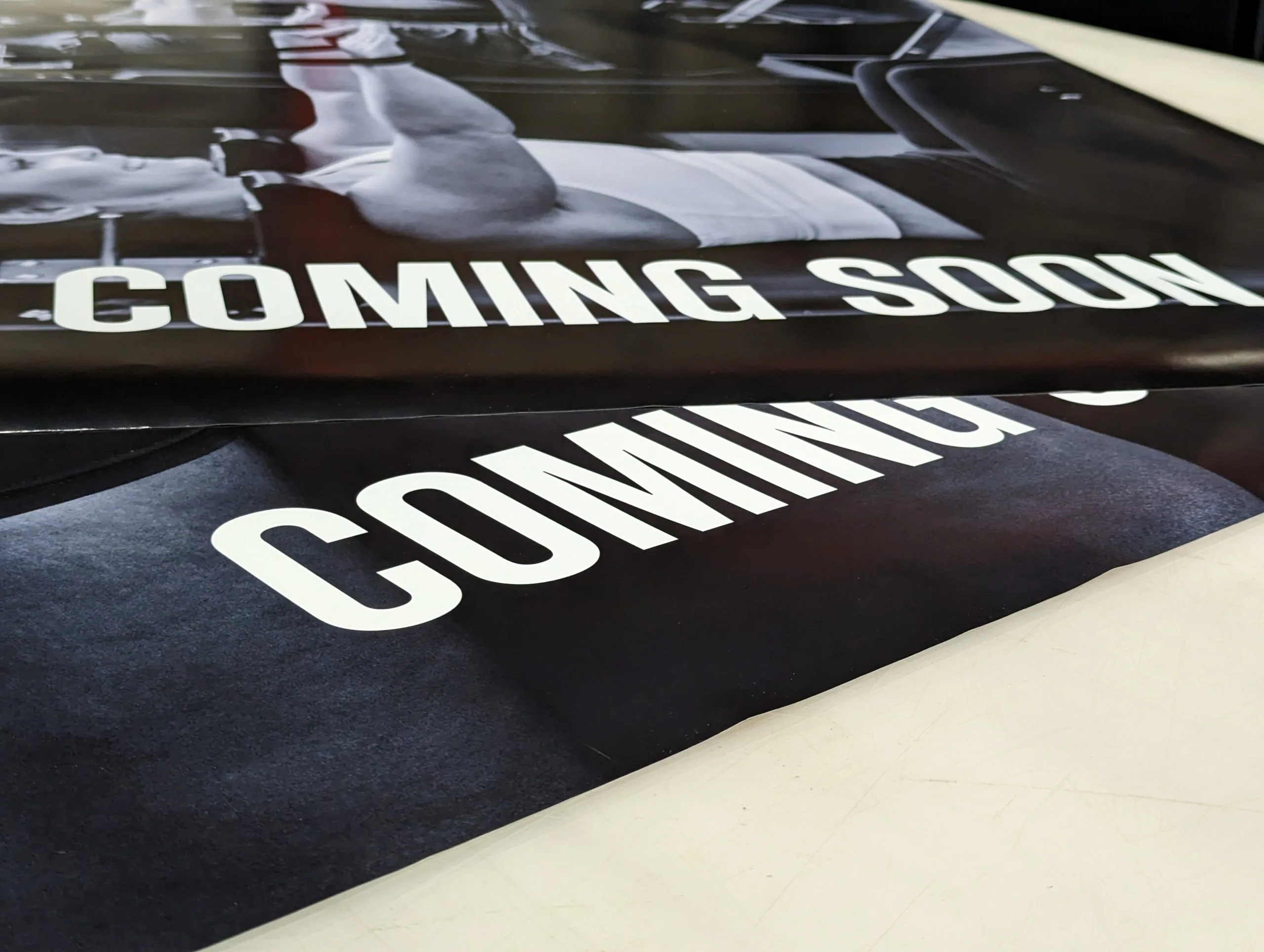 Printed coming soon signs prepared for a storefront under fit out