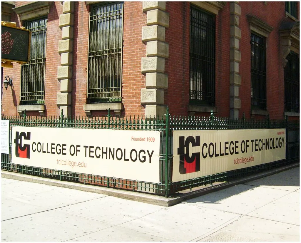 Vinyl banners hung on a fence