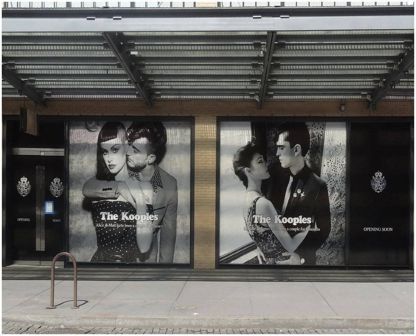 Black and white fashion window graphics for The Kooples filling two large storefront windows