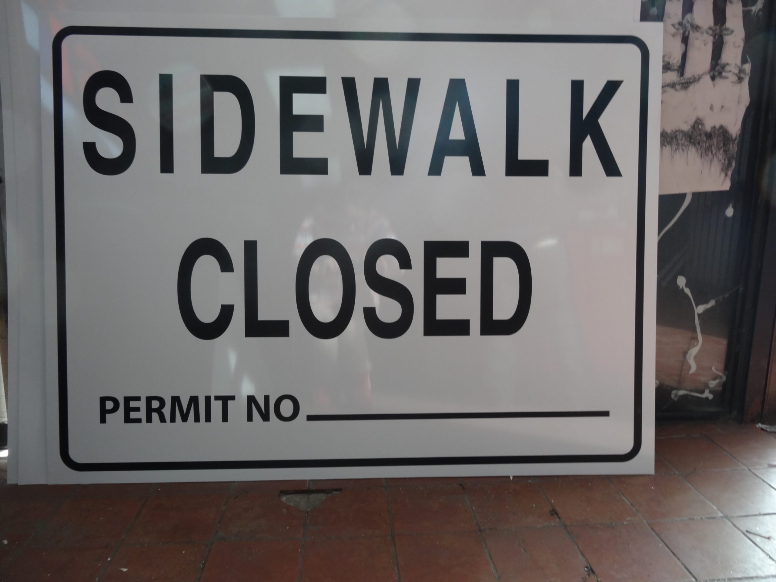 sidewalk closed gogi signs