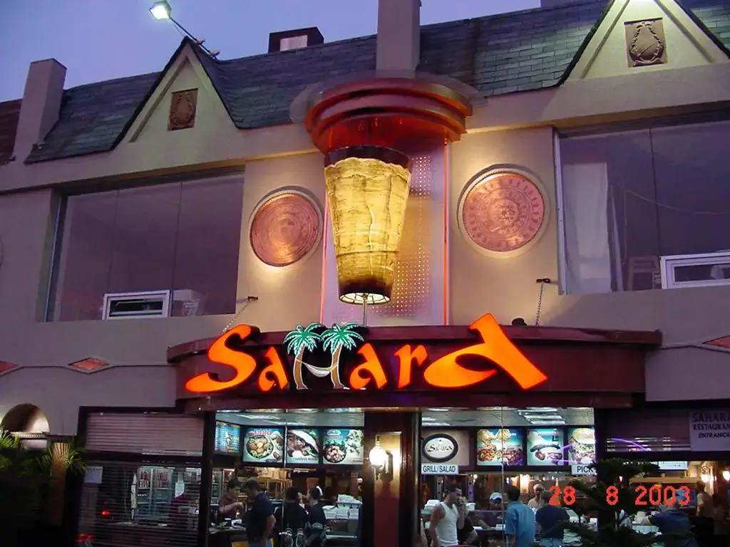 Lit letters keep a storefront visible after dark