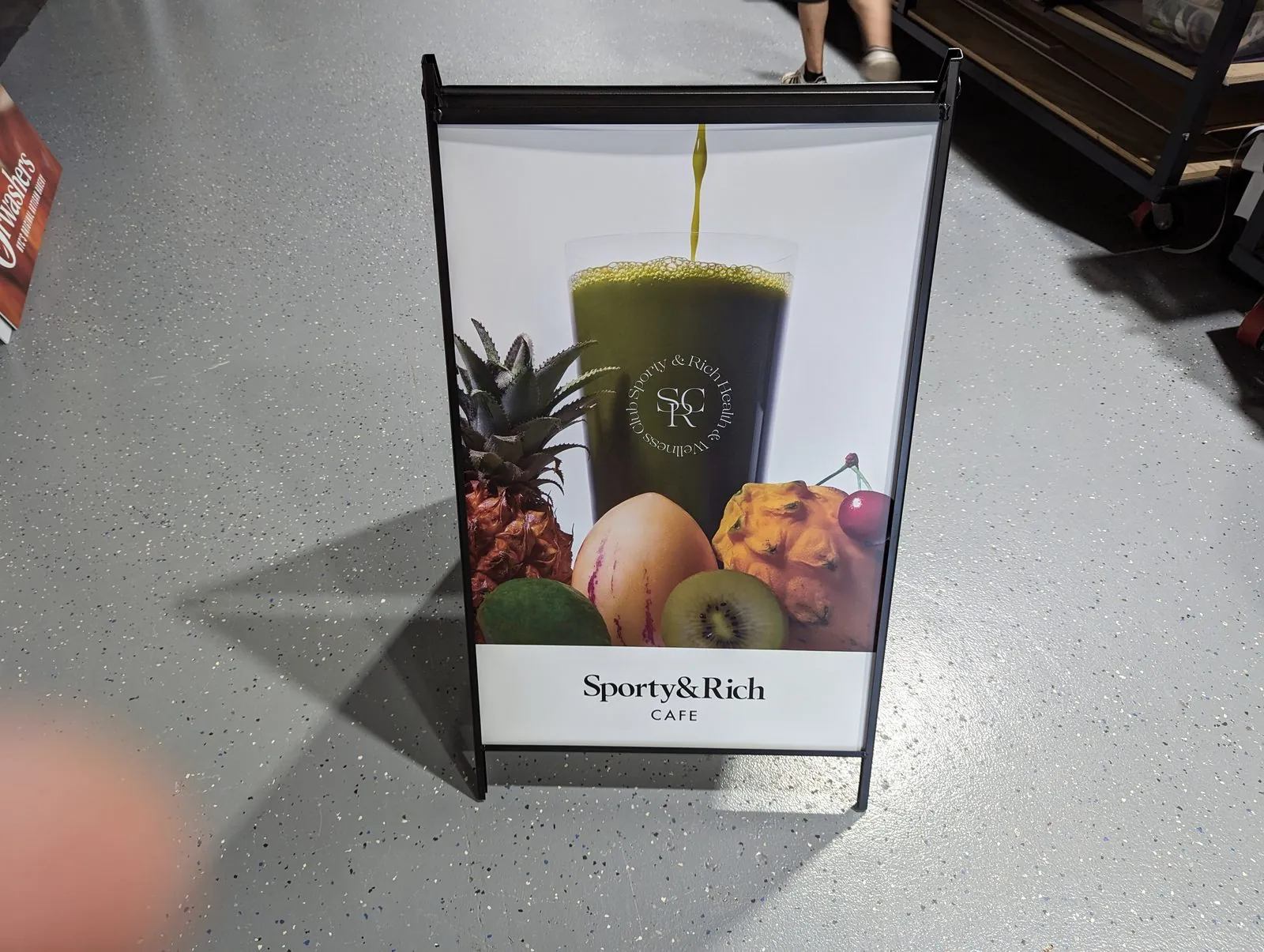 Black A frame with a full color smoothie and fruit photo