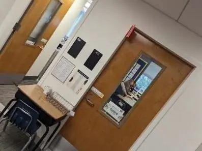 ADA room signs next to classroom doors