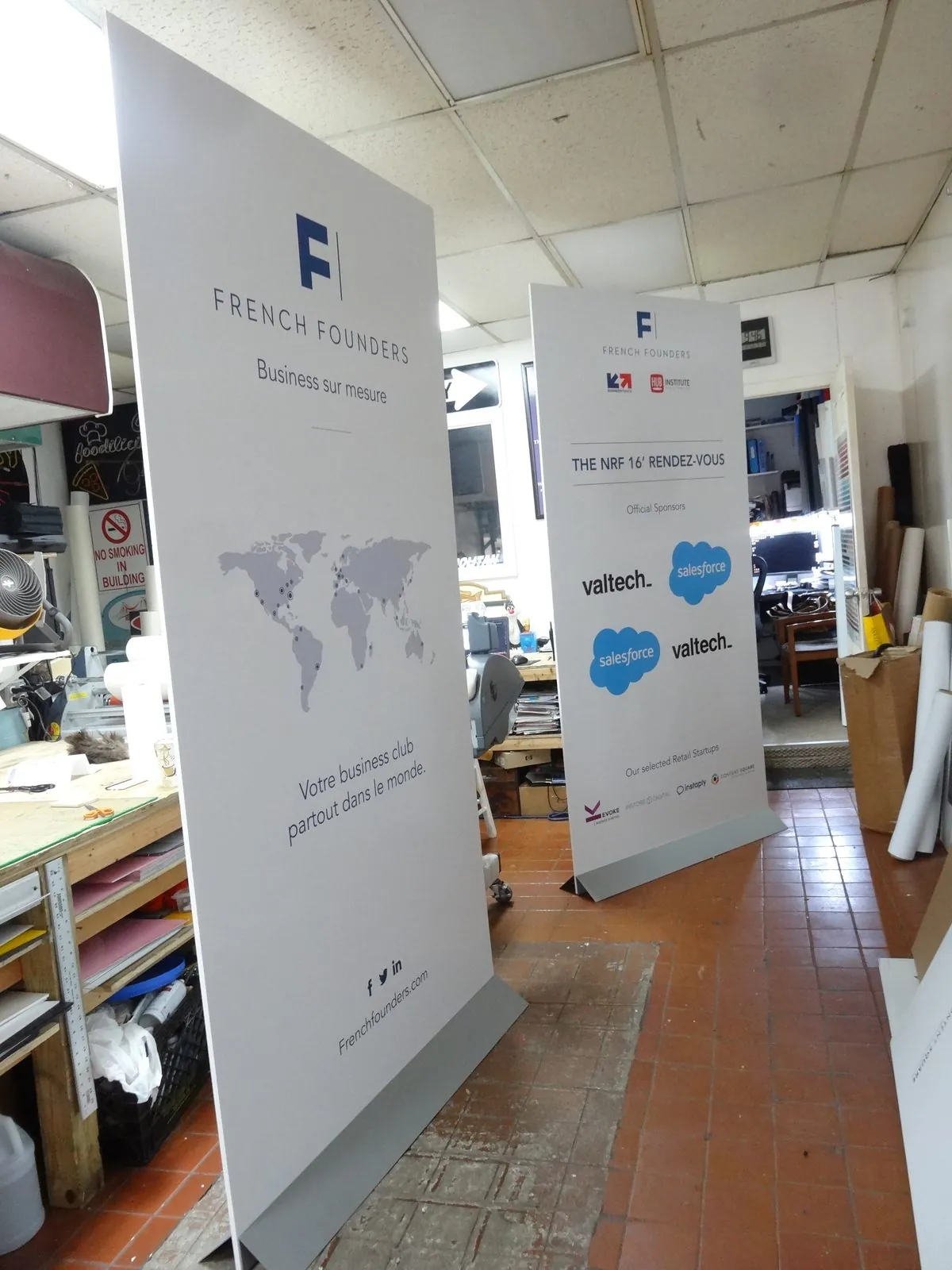 Two tall freestanding displays set up in our shop for a final check